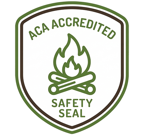 Official American Camp Association (ACA) Accredited Safety Seal featuring a campfire icon.